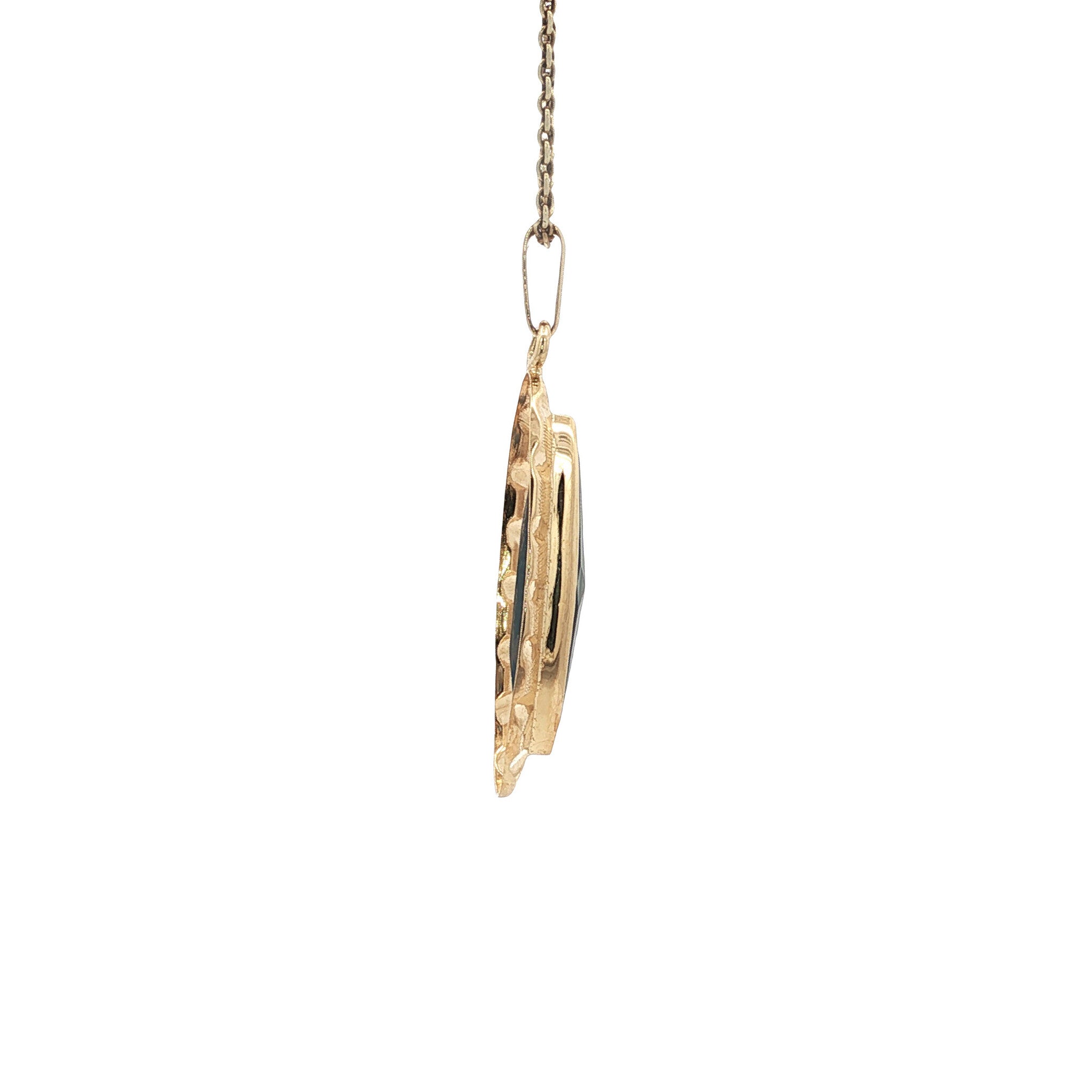 Golden vintage pendant with spinel 14 kt