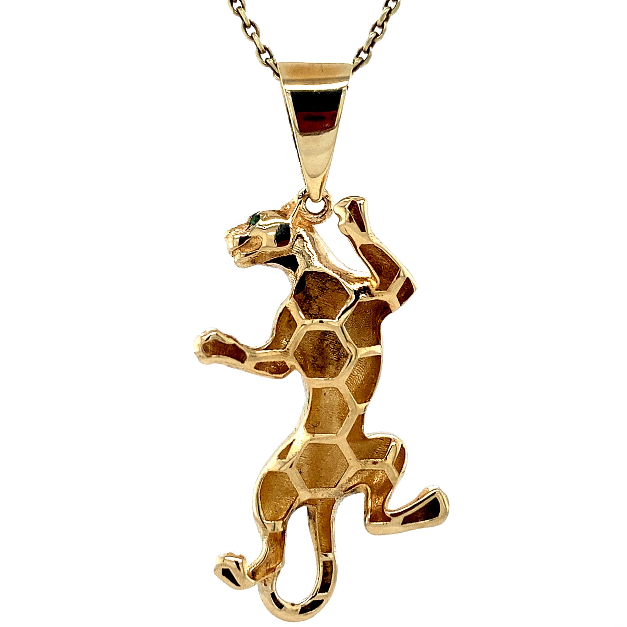 Vintage 14 kt gold panther pendant with colored stone