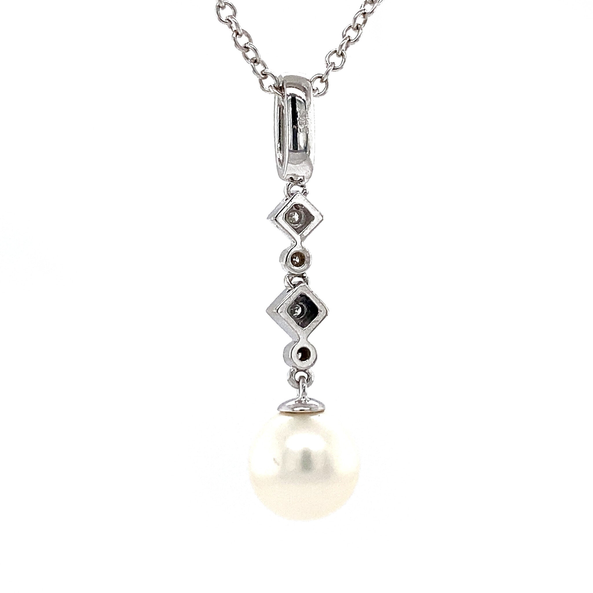 White gold pendant with diamond and pearl 14 krt