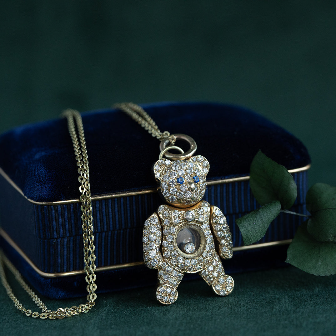 14 kt gold vintage bear pendant with zirconia and colored stone