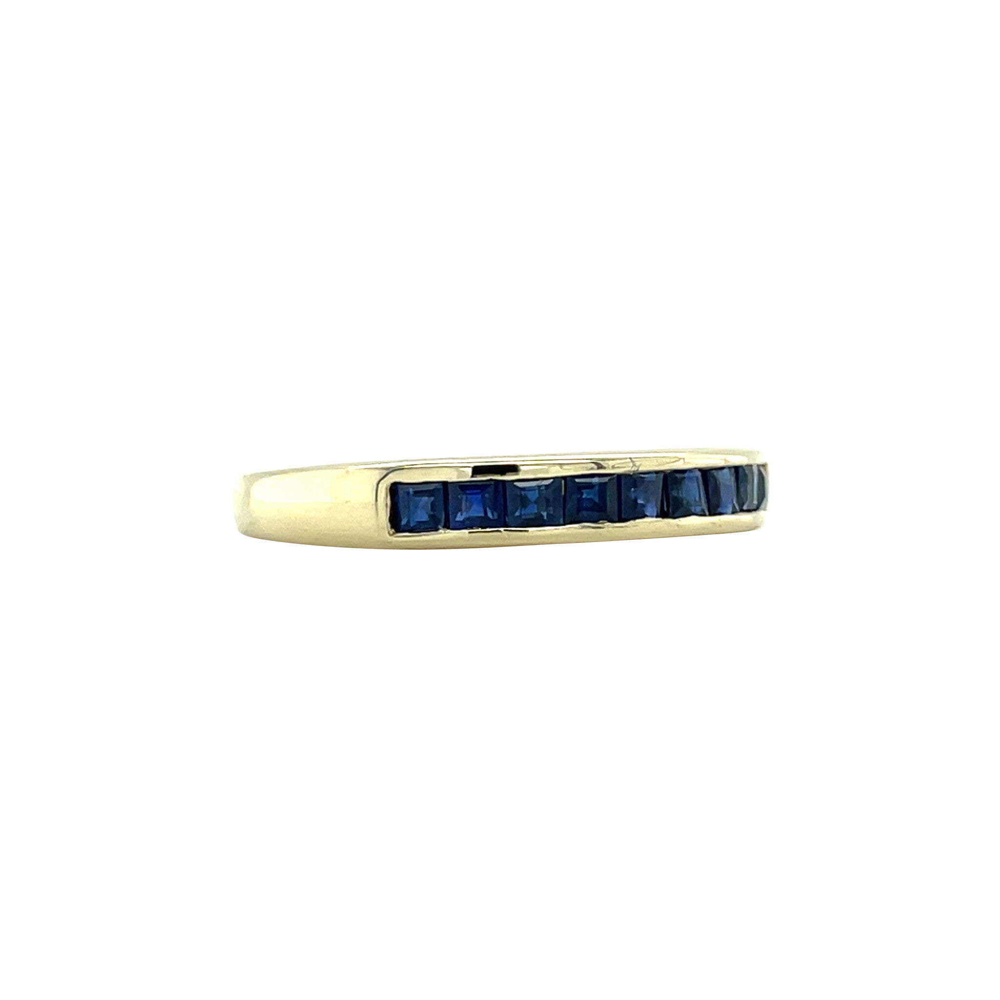 14 kt gold band with sapphire