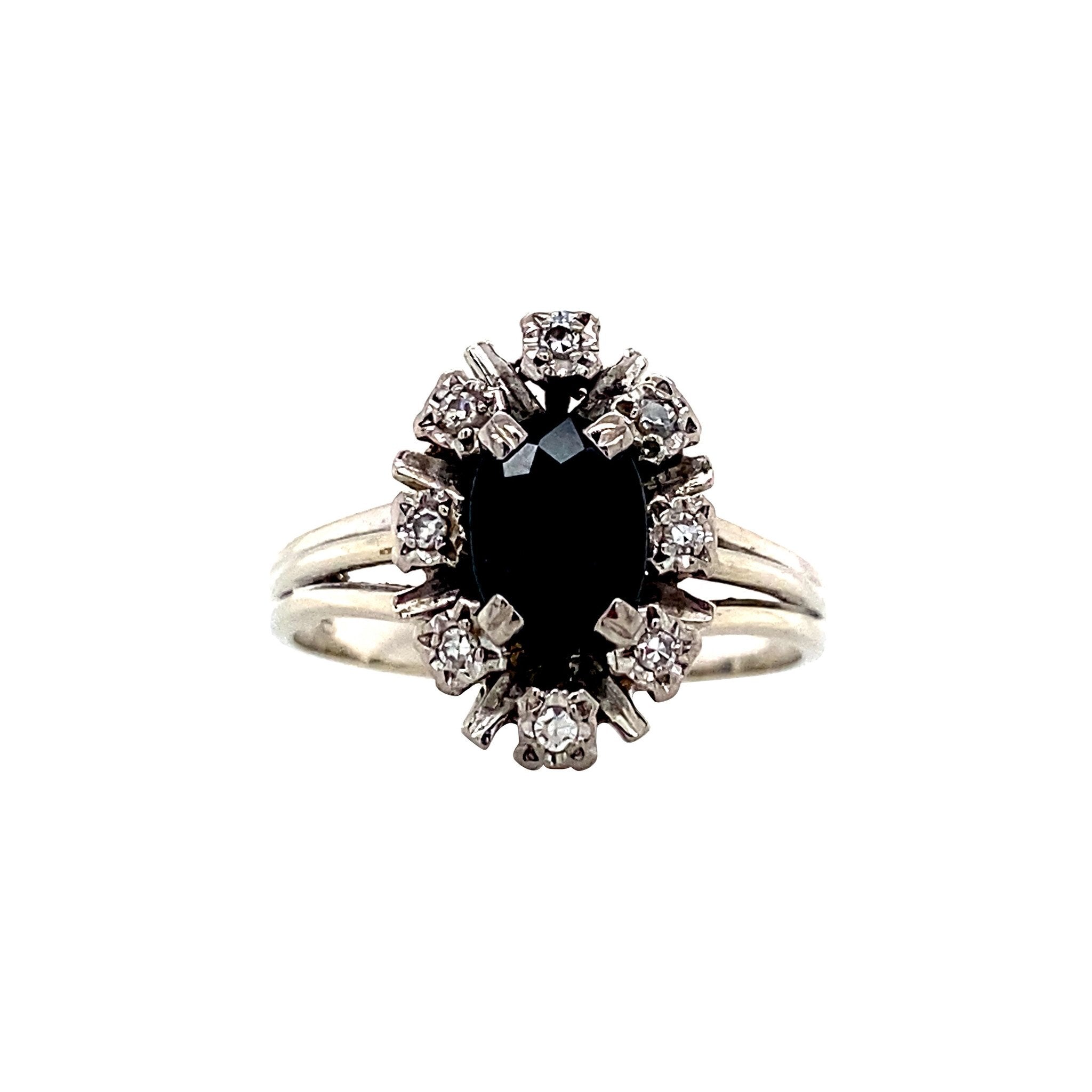 Witgouden entourage ring met diamant en saffier 18 krt