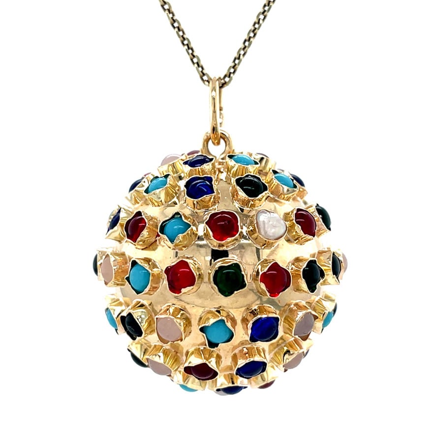 Gold vintage sputnik pendant with colored stone, 14 kt