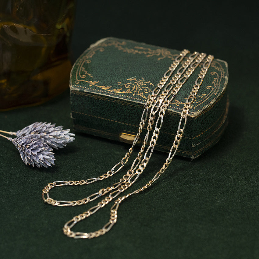 Two-tone gold vintage Figaro necklace 14 kt