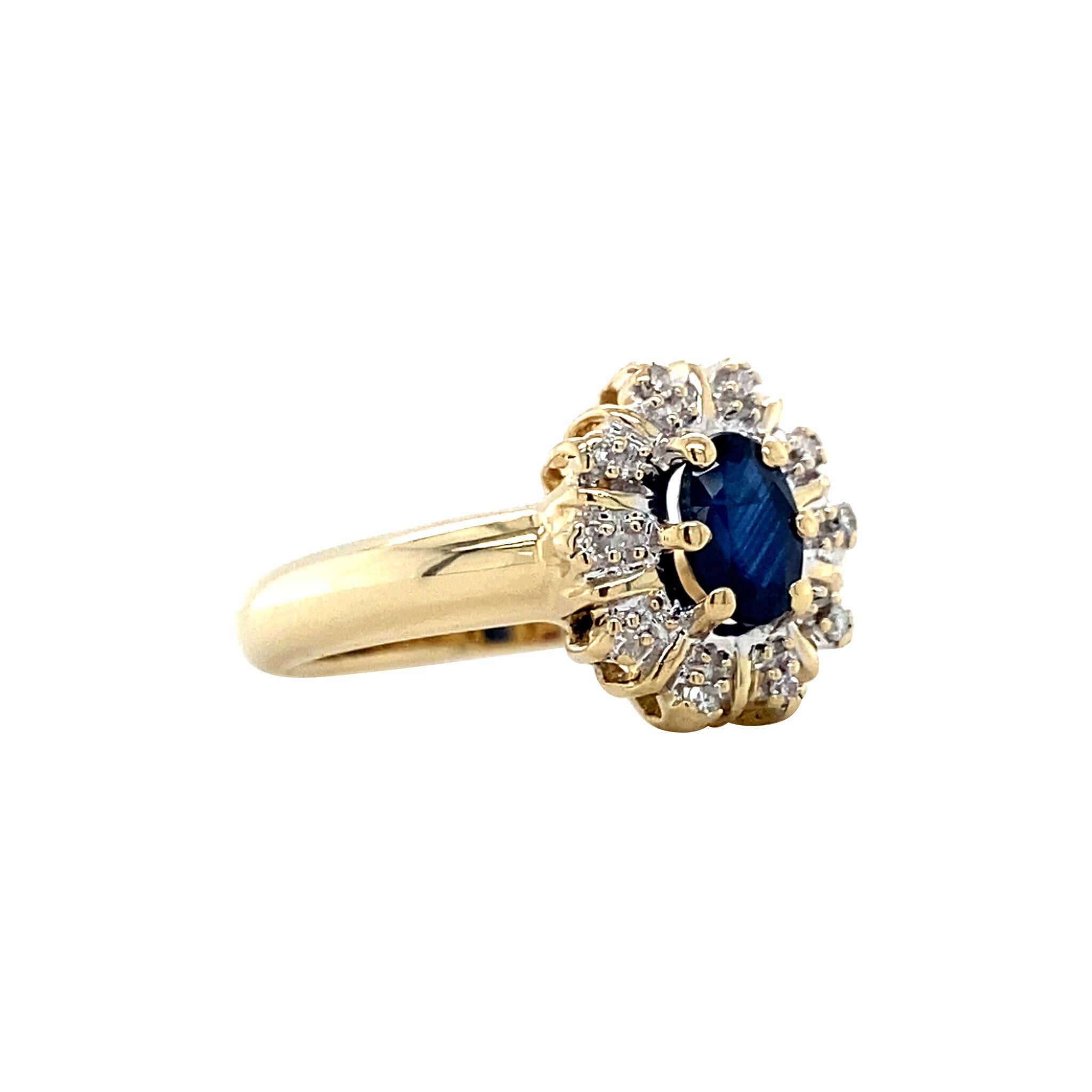 Gouden vintage entourage ring met saffier en diamant 14 krt