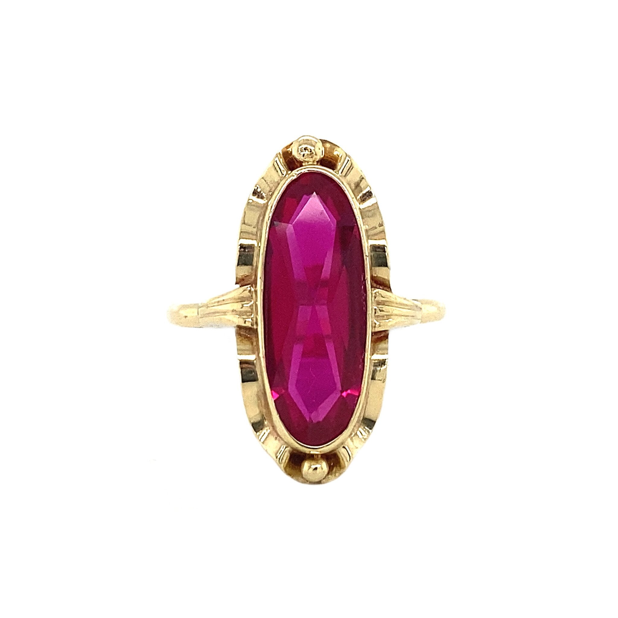 14 kt gold ring with ruby