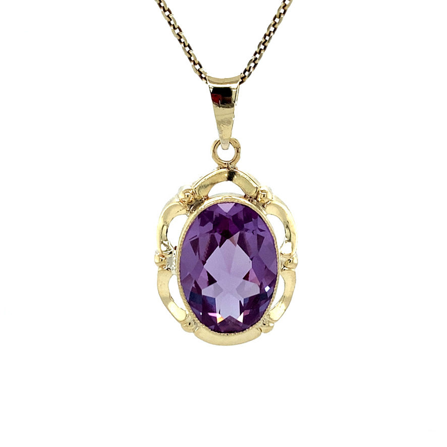 Vintage 14 kt gold pendant with sapphire