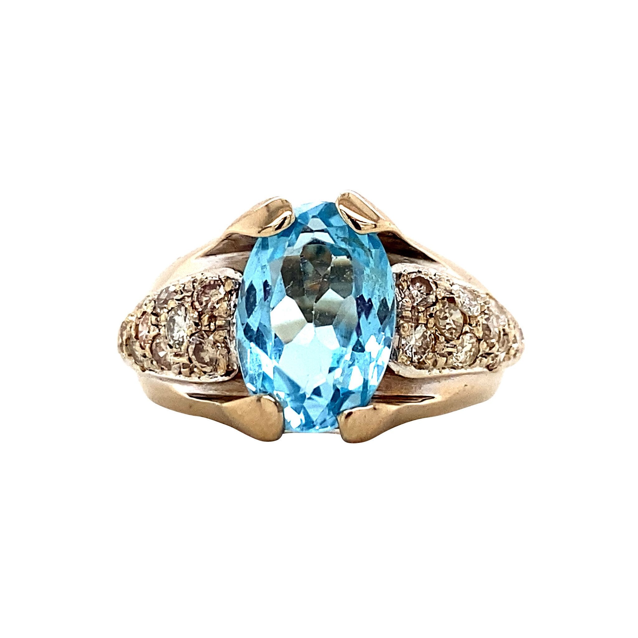 Geelgouden ring met topaas en diamant 18 krt