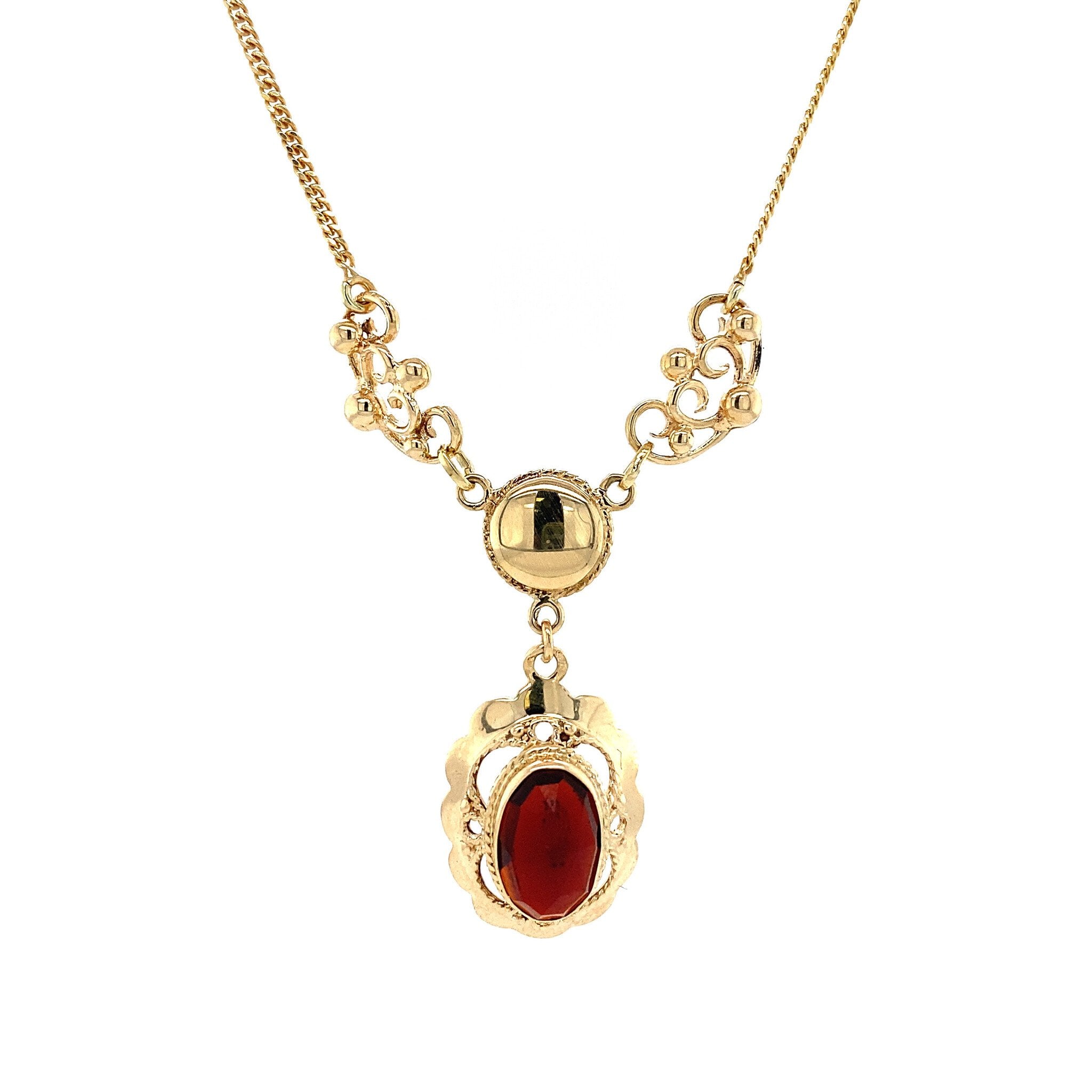 14 kt gold fantasy necklace with garnet, 42 cm