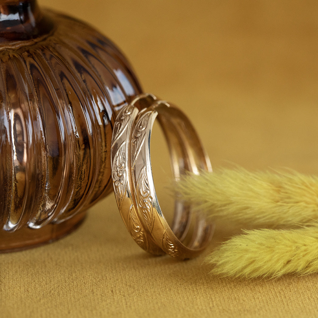 Gouden fantasie oorringen 18 krt