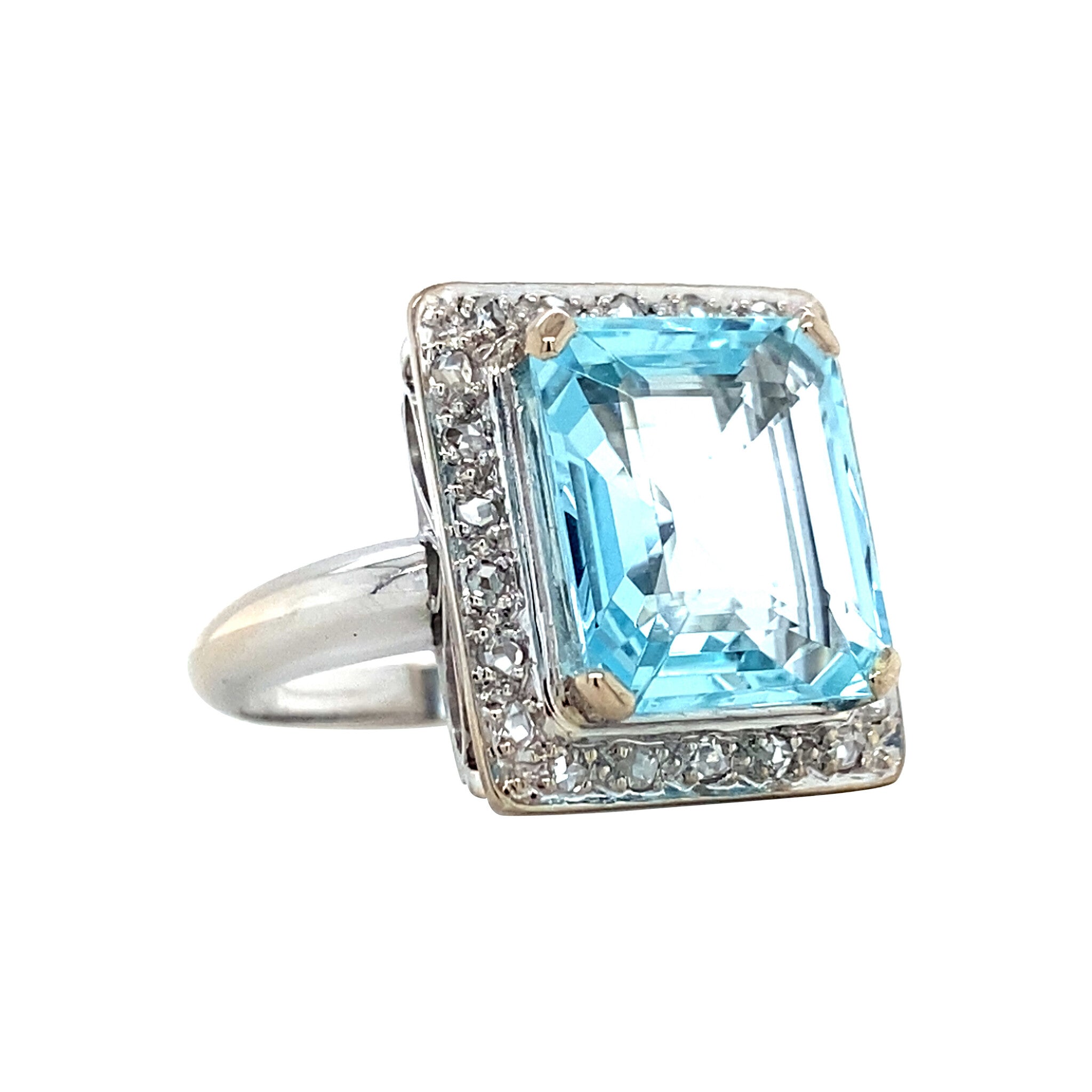 White gold ring with aquamarine and rose diamond 14 kt