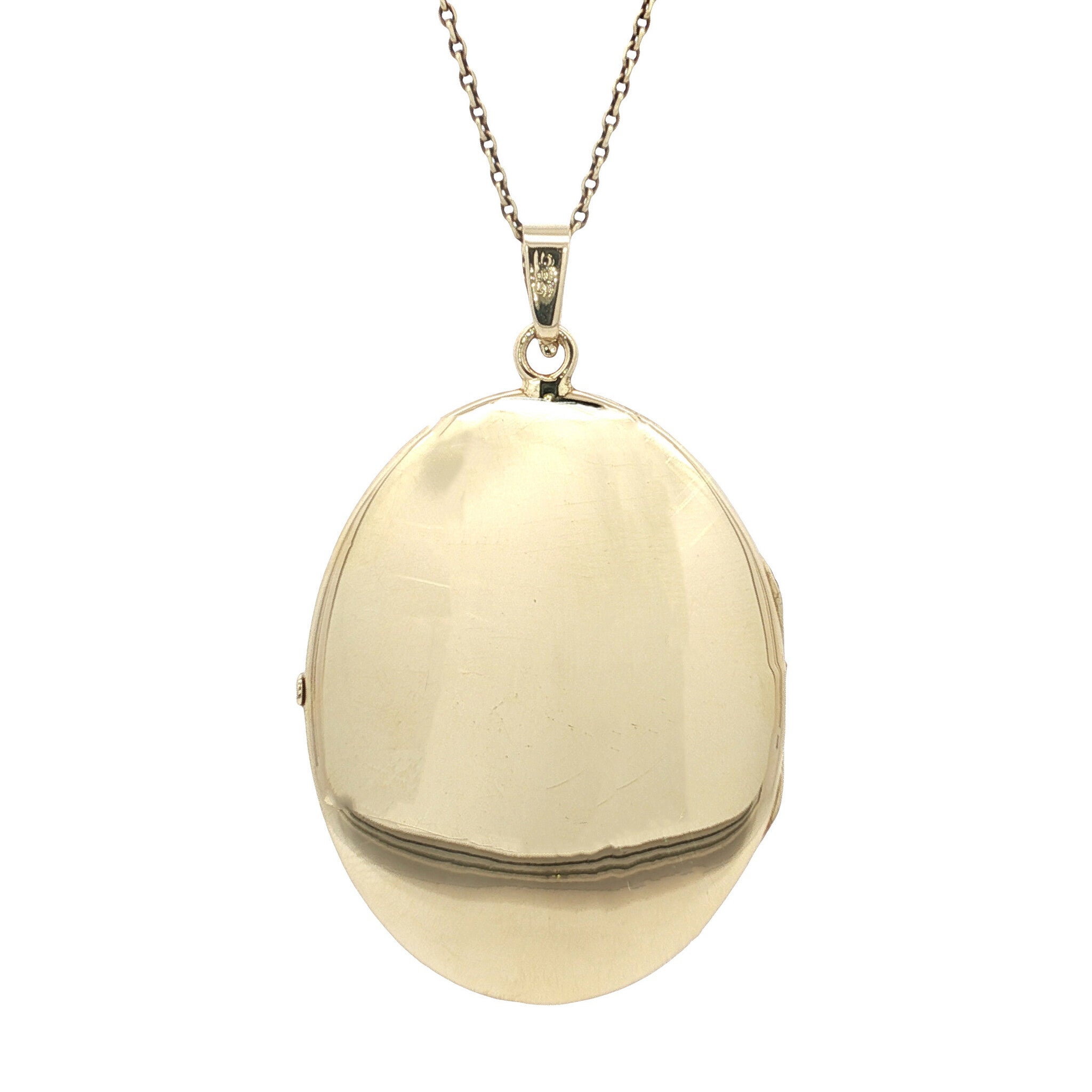 Vintage 14 kt gold locket with engraving