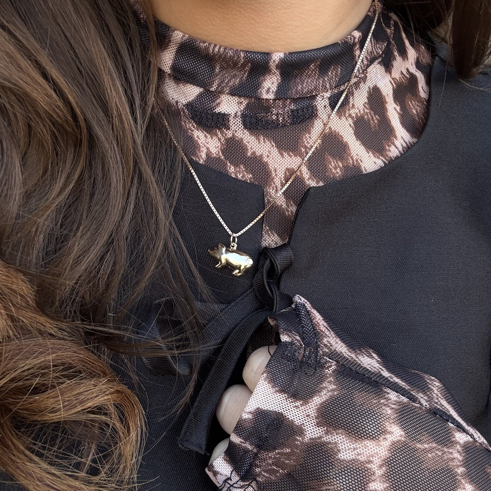 14 kt gold pig pendant