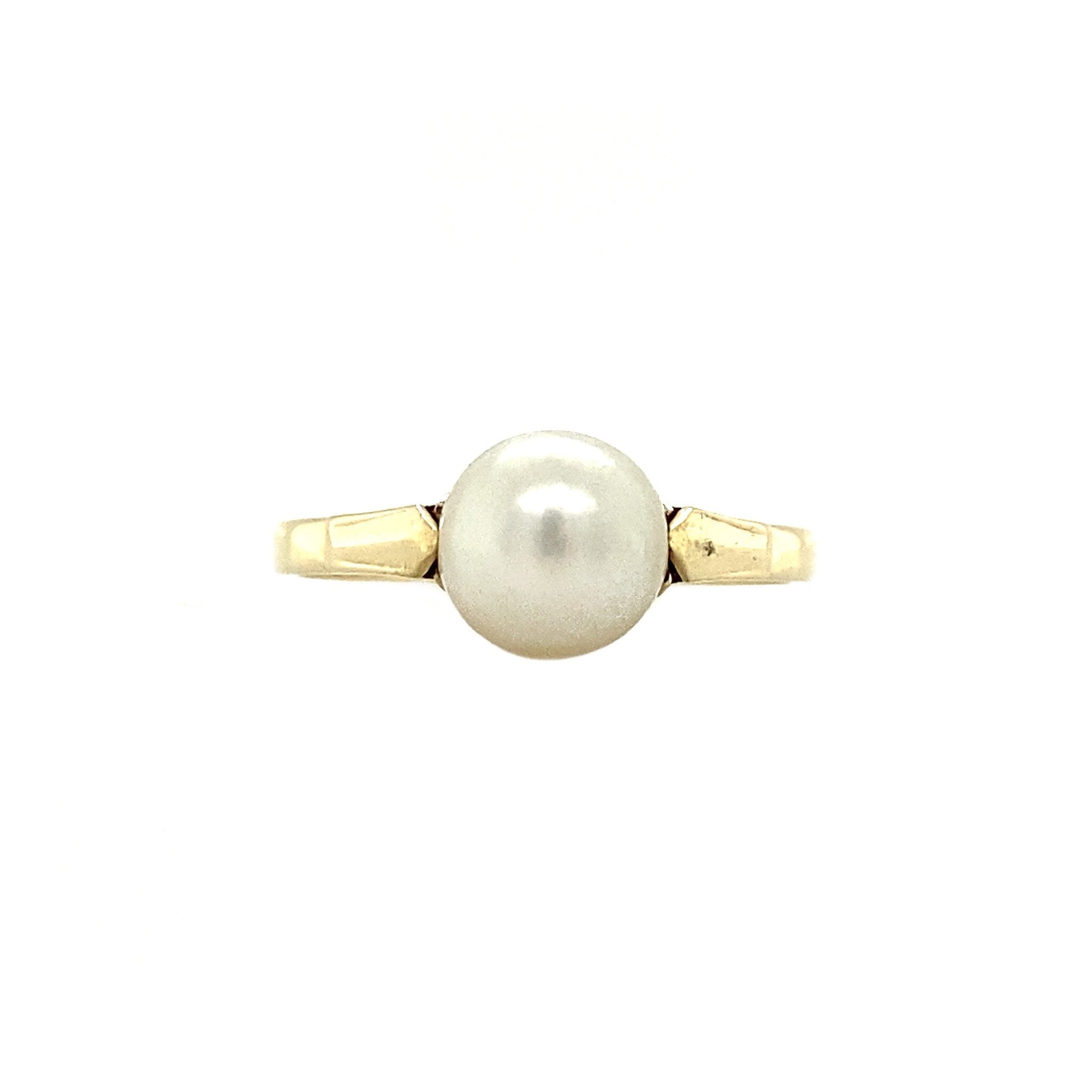 14 kt gold ring with pearl