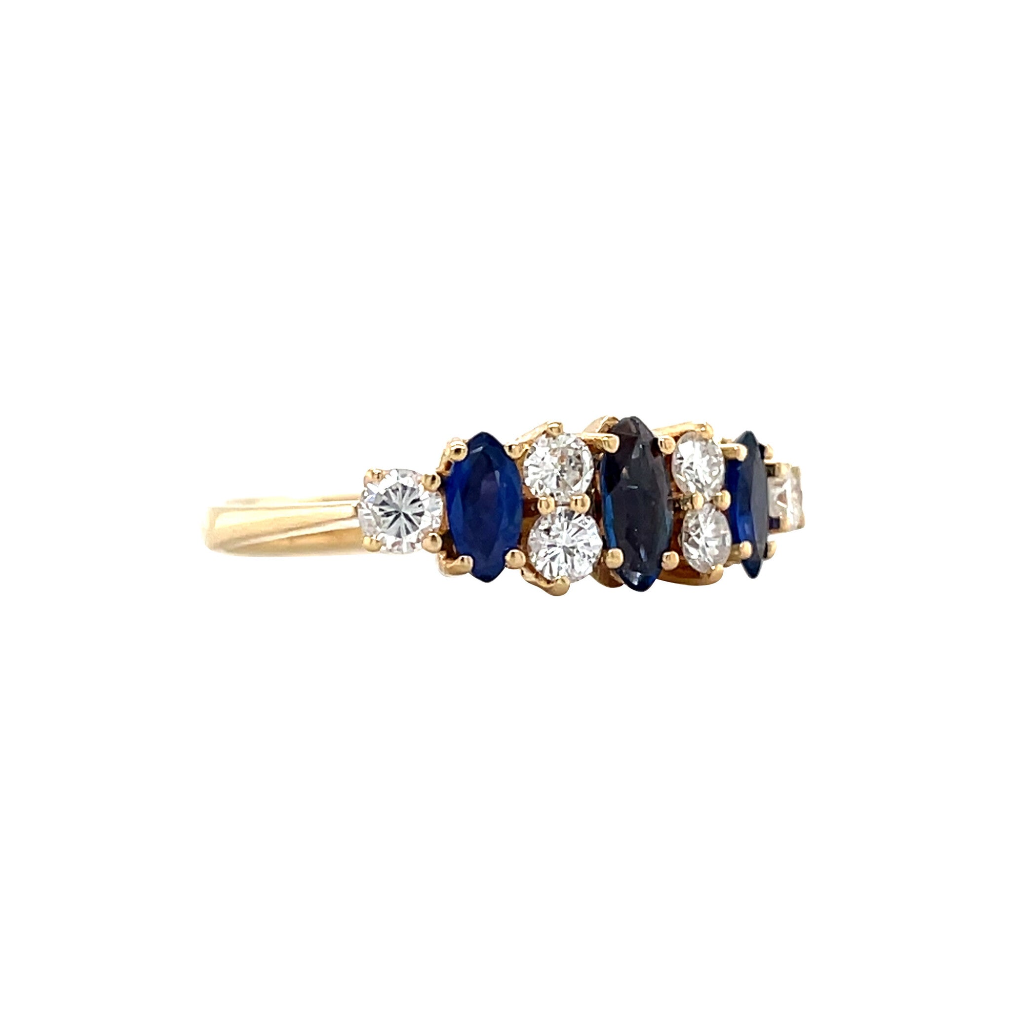Gold row ring with sapphire and diamond 18 kt