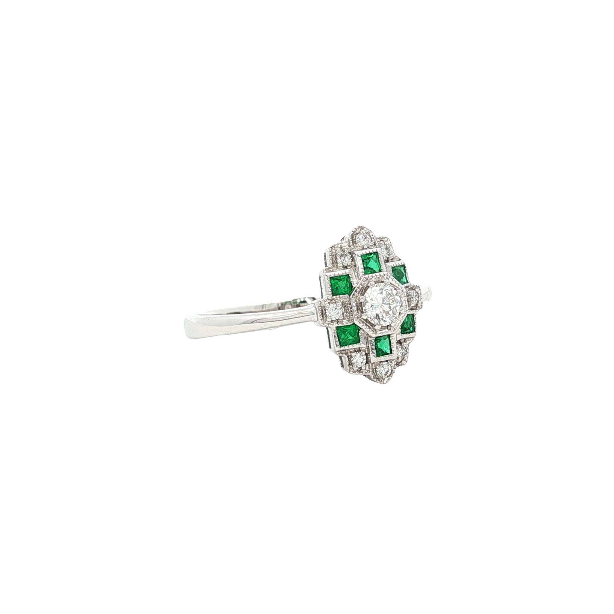 Gold ring with emerald and diamond 14 kt