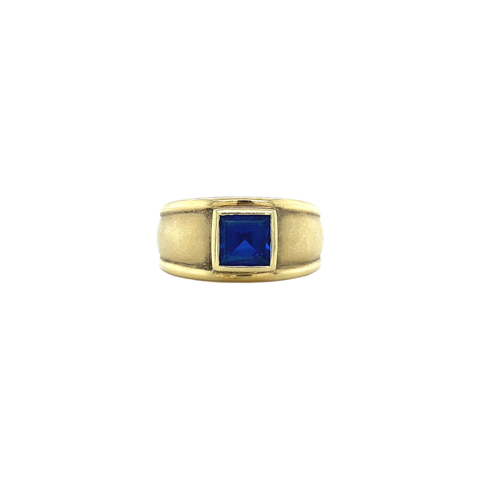 Gouden ring met synthetische saffier 14 krt