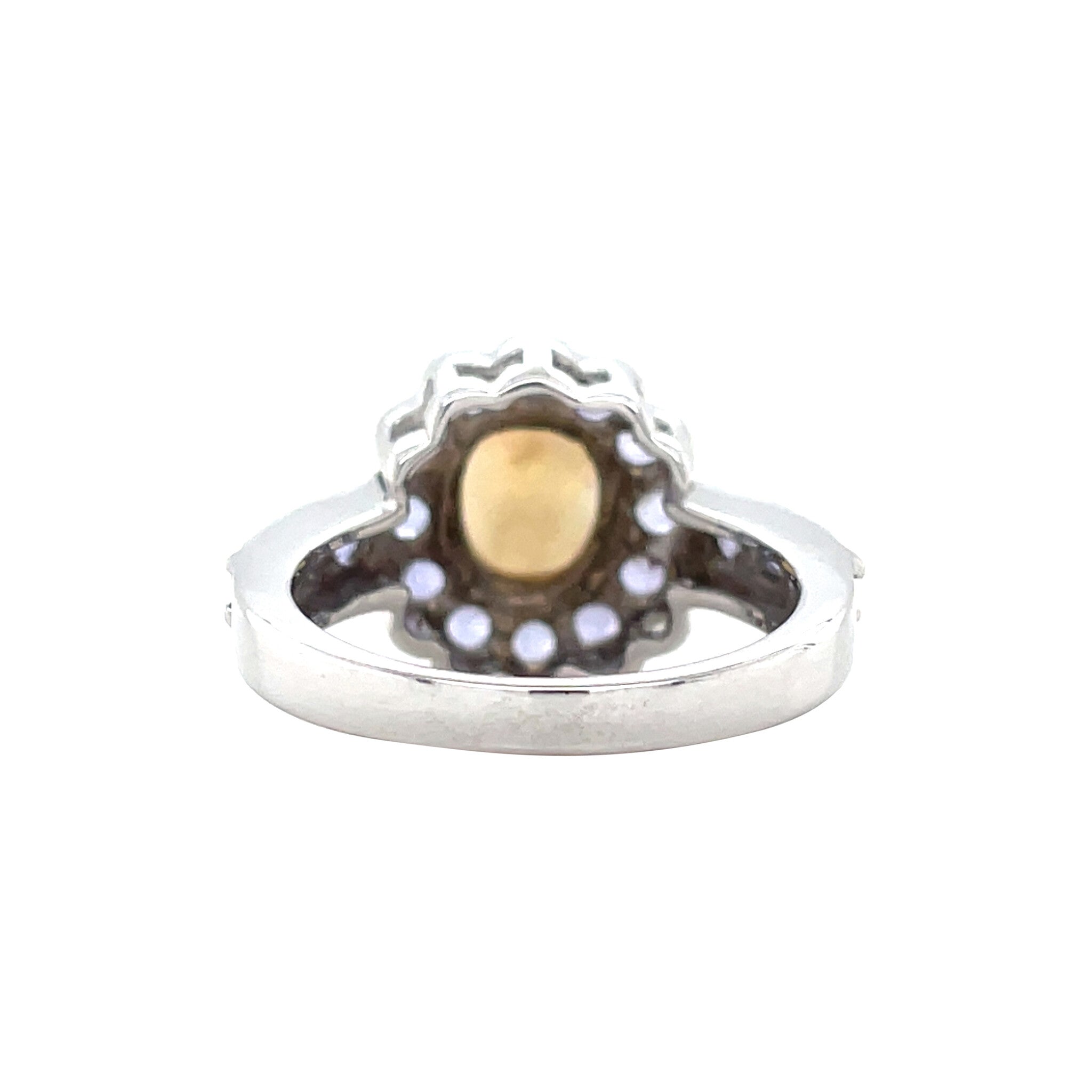Vintage entourage ring met opaal en tanzaniet 10 krt