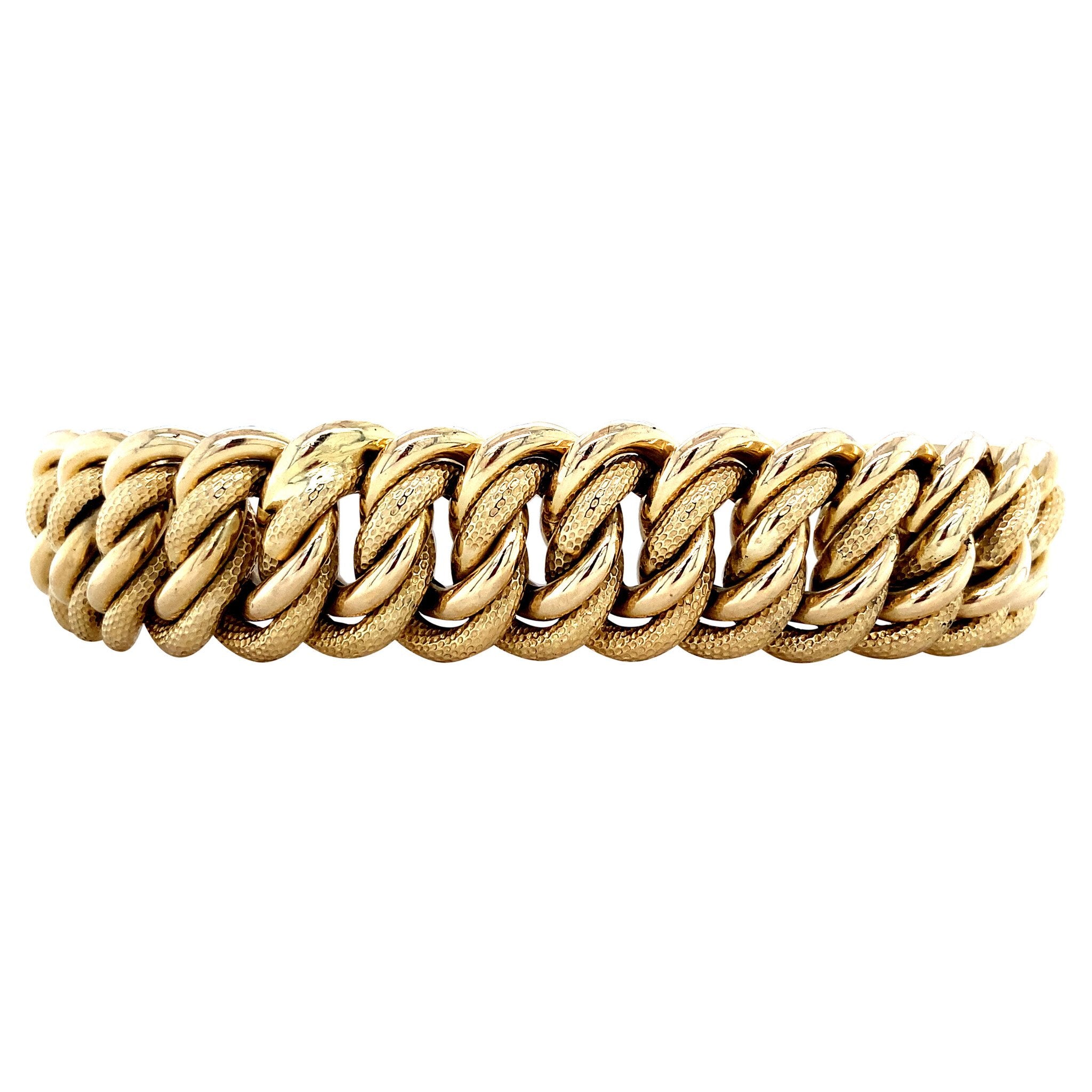 Gold curb bracelet 18 krt