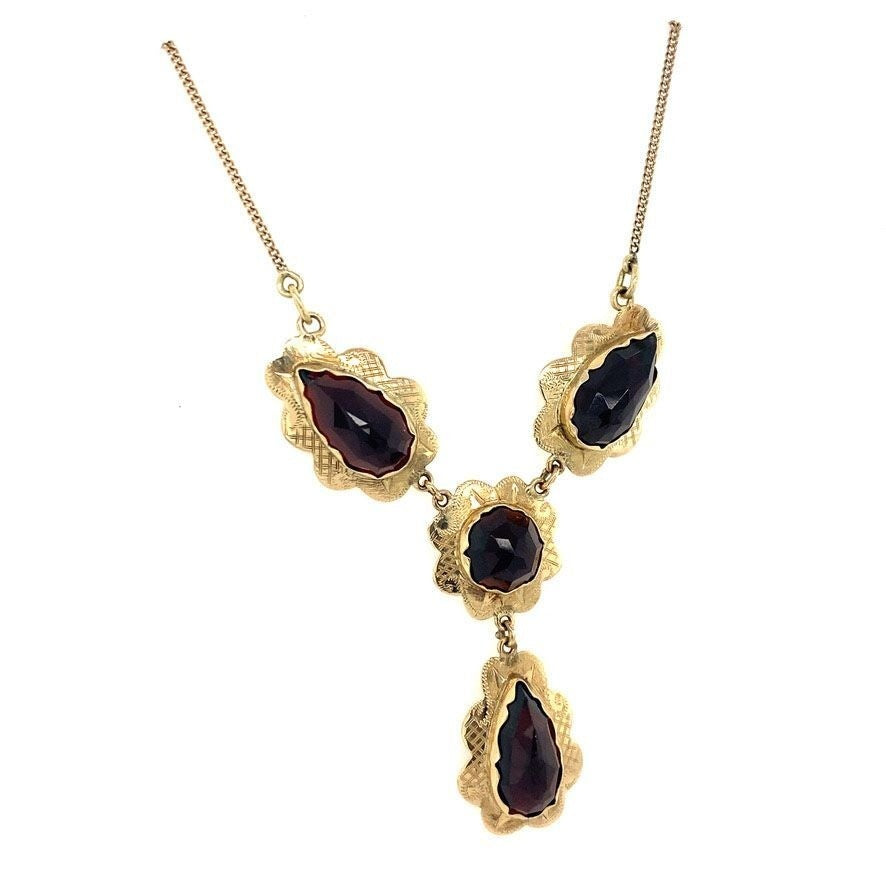 Gouden collier met granaat 14 krt