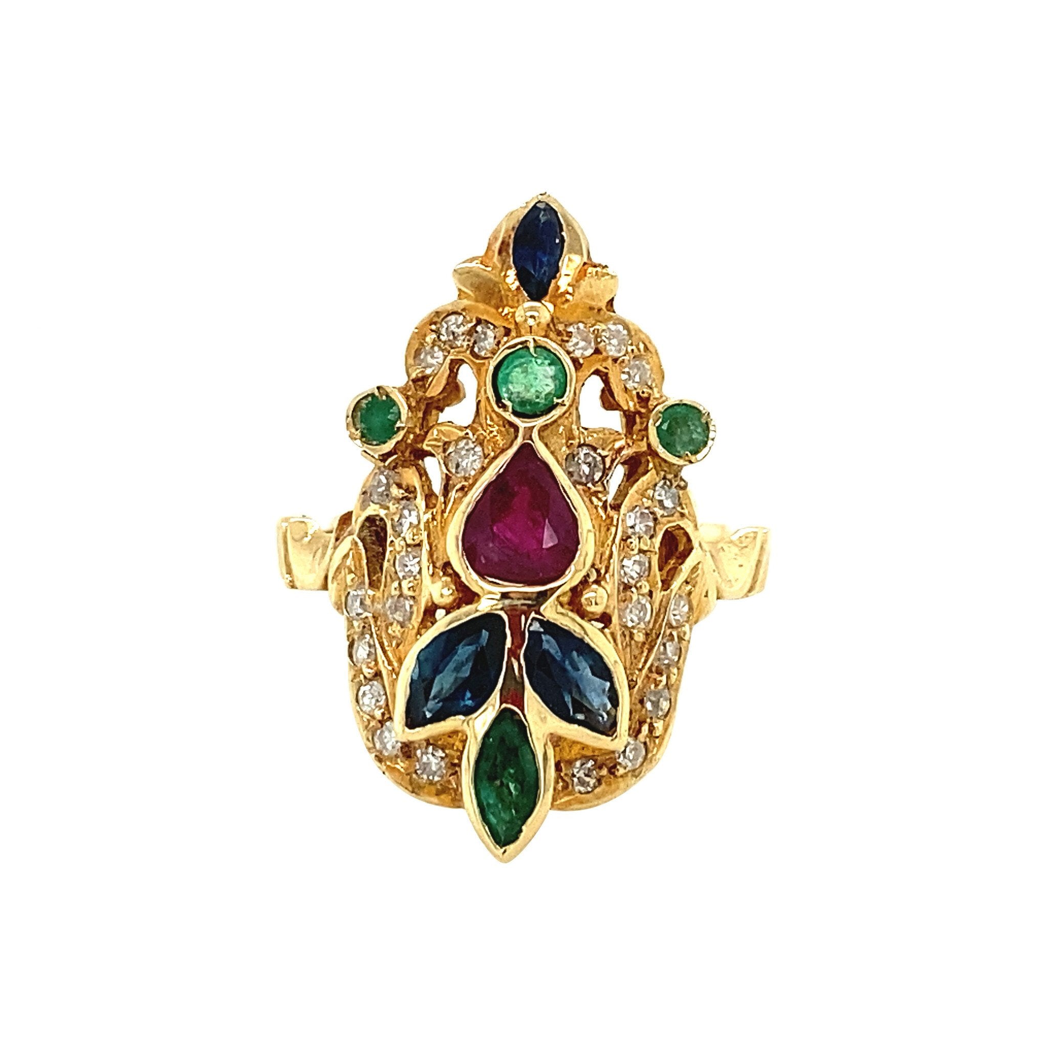 Gold ring with emerald, sapphire, ruby and diamond 18 krt