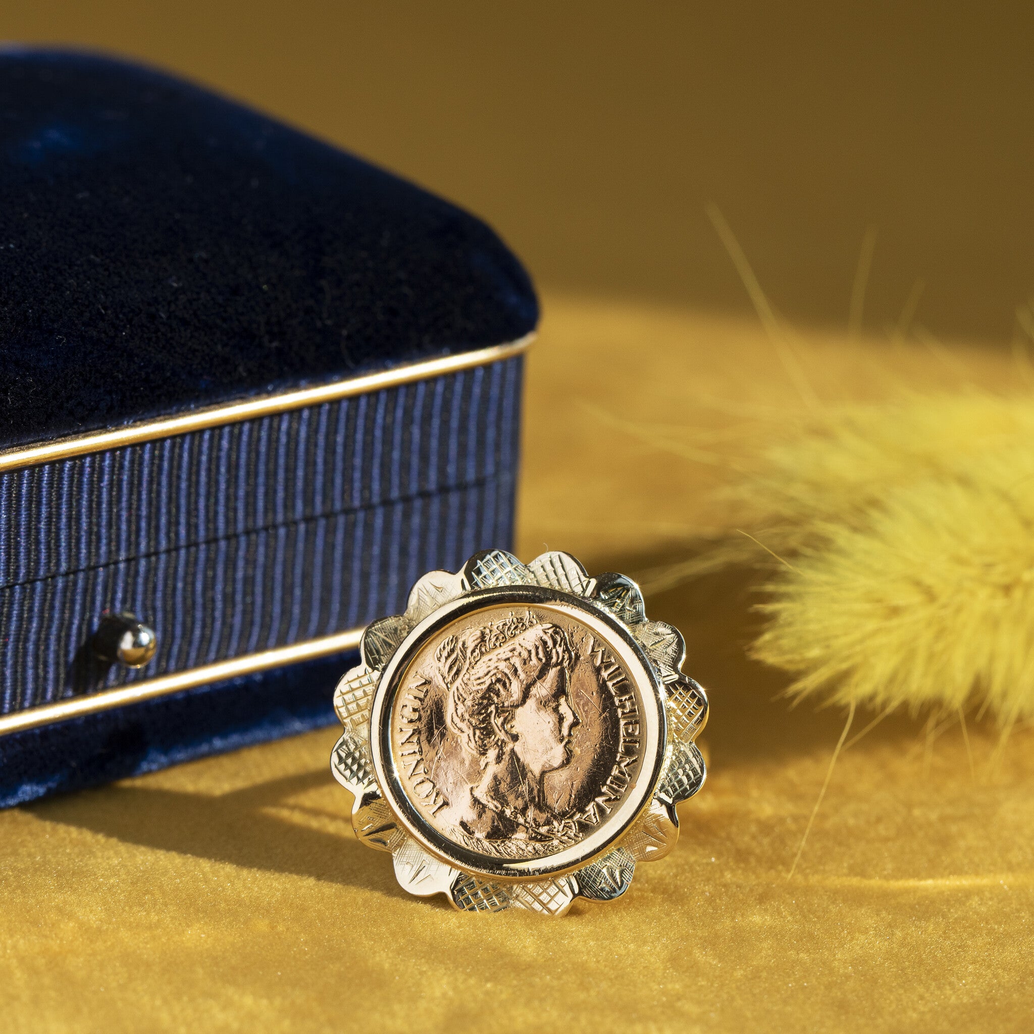 Gouden ring met munt 14 krt