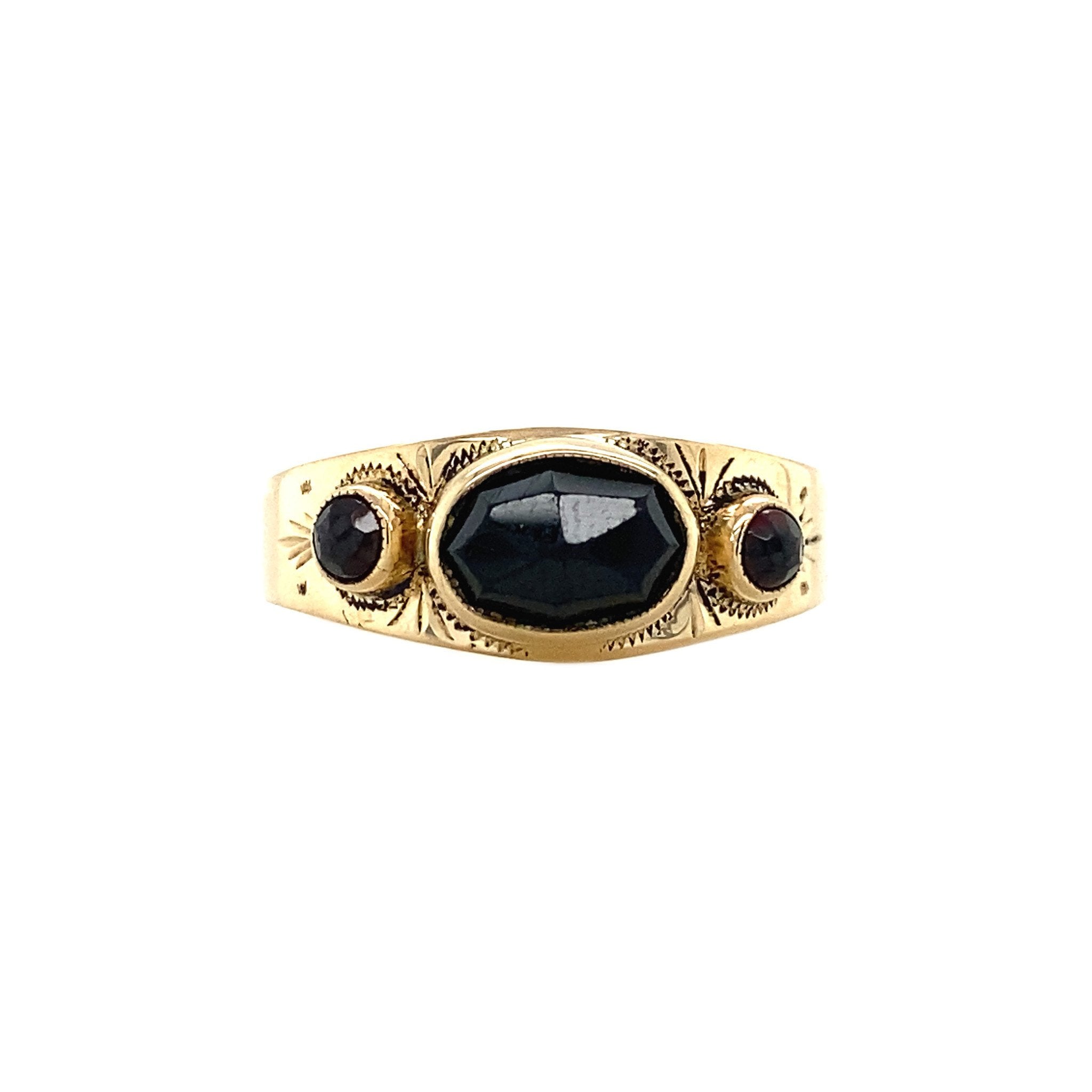 14 kt gold ring with garnet