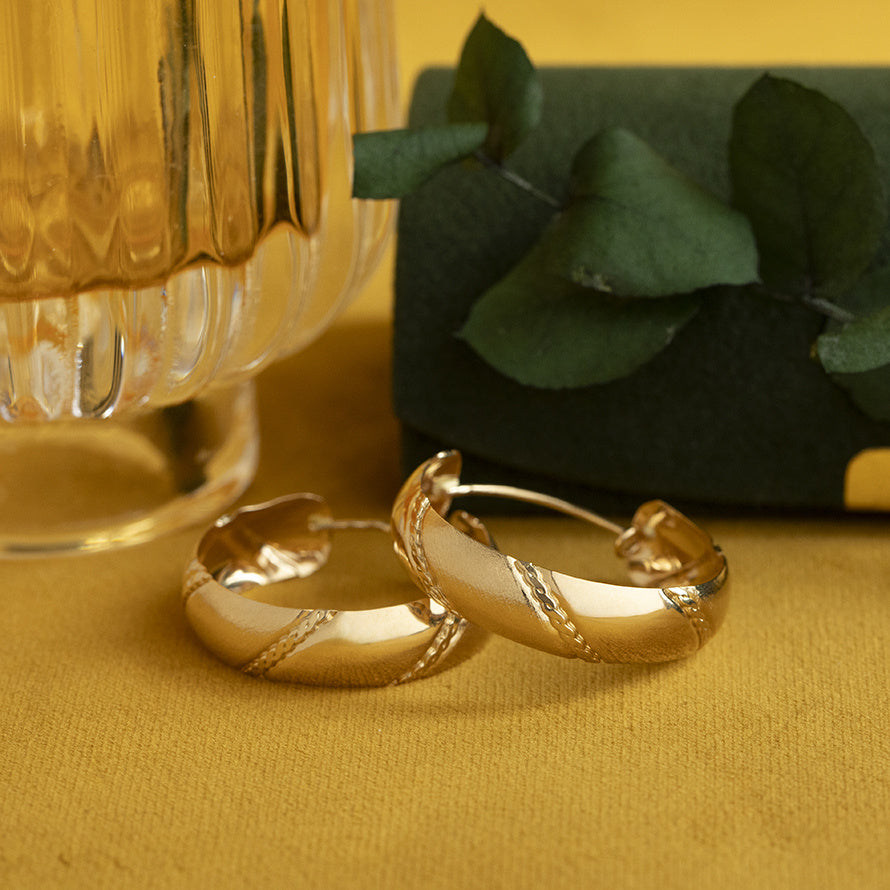 14 kt gold vintage fantasy hoop earrings