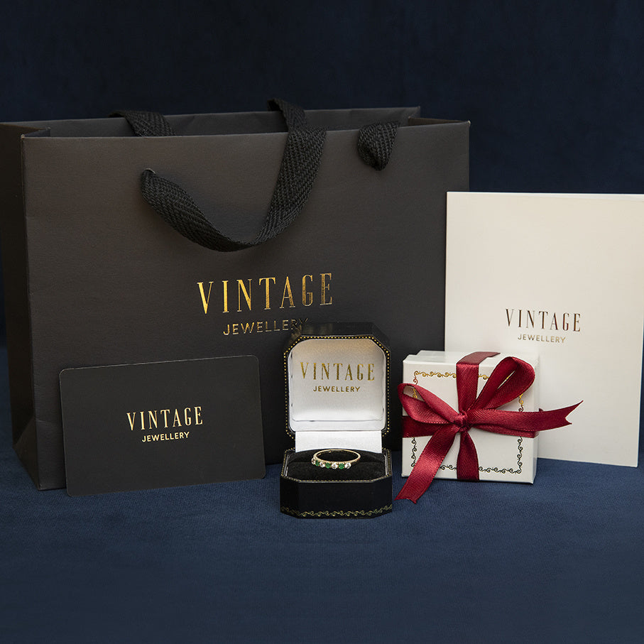 Gouden vintage slagring met saffier en diamant 18 kt