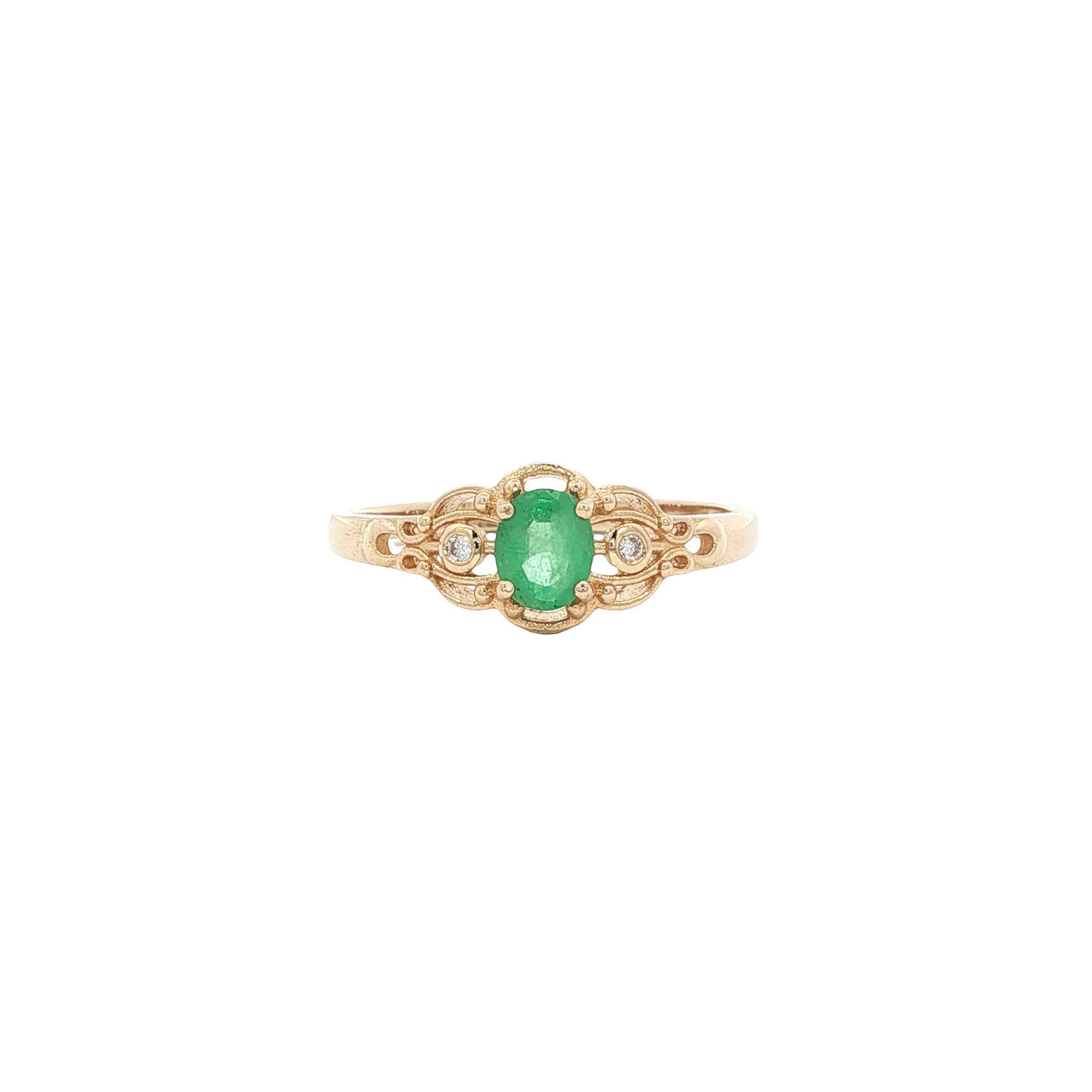 Gouden ring met smaragd en diamant 14 kt