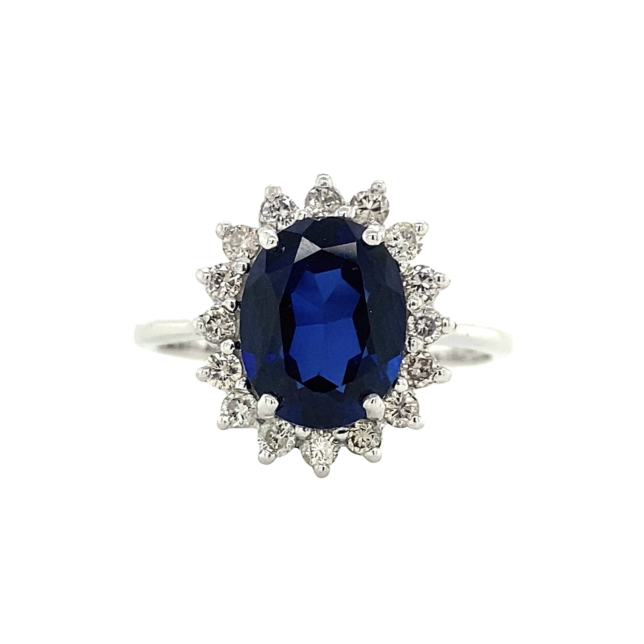 Witgouden entourage ring met saffier en diamant 18 krt