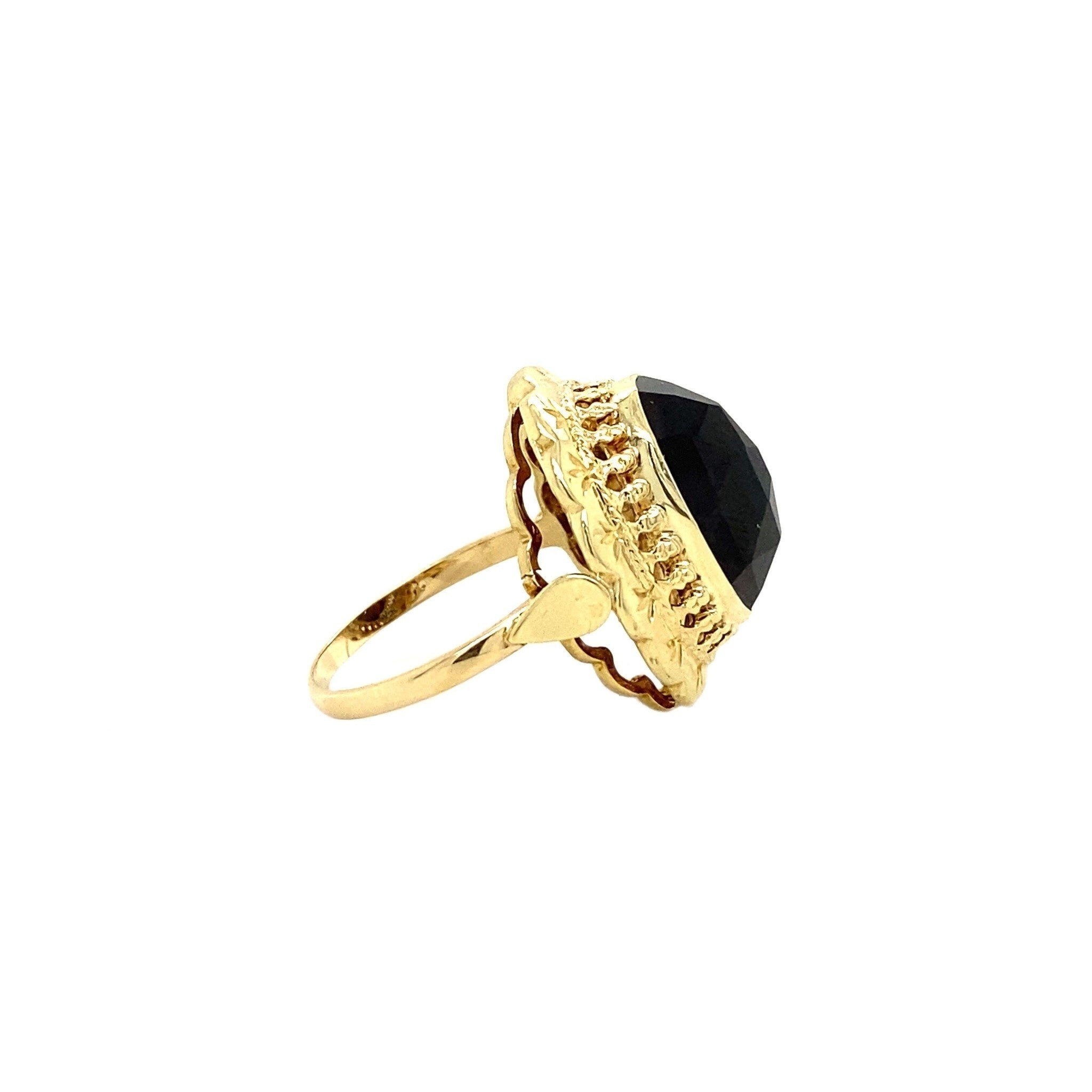Gouden ring met granaat 14 krt