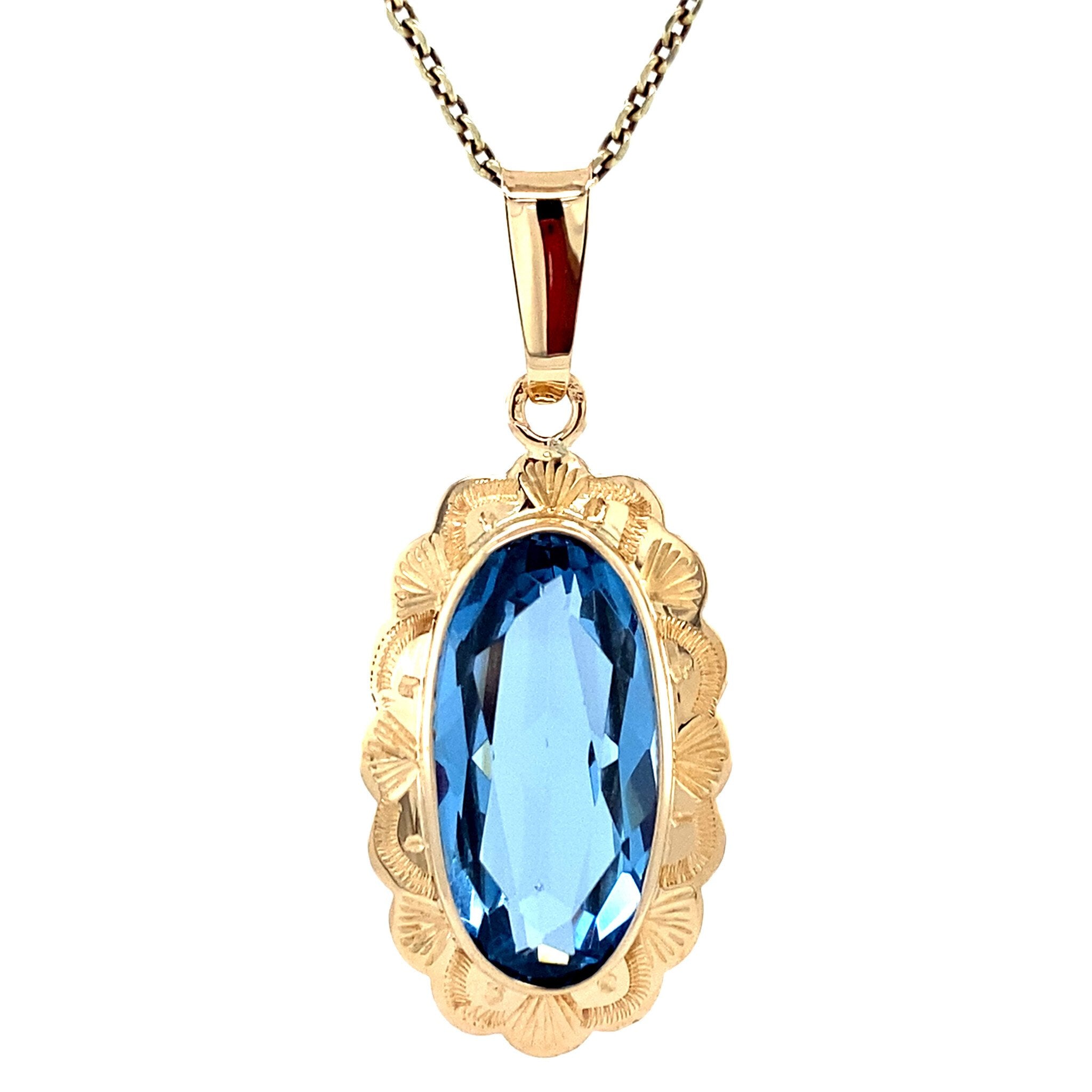 Gouden hanger met spinel 14 krt