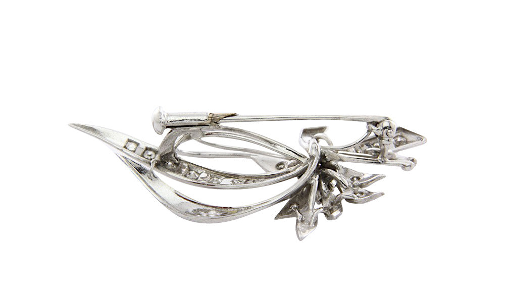 Gouden broche met 0.81crt. diamant 14 krt