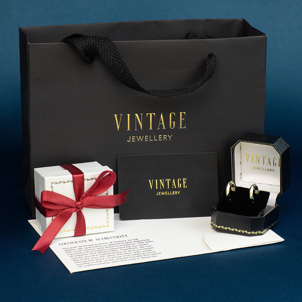 Gouden vintage fantasie oorringen 14 kt