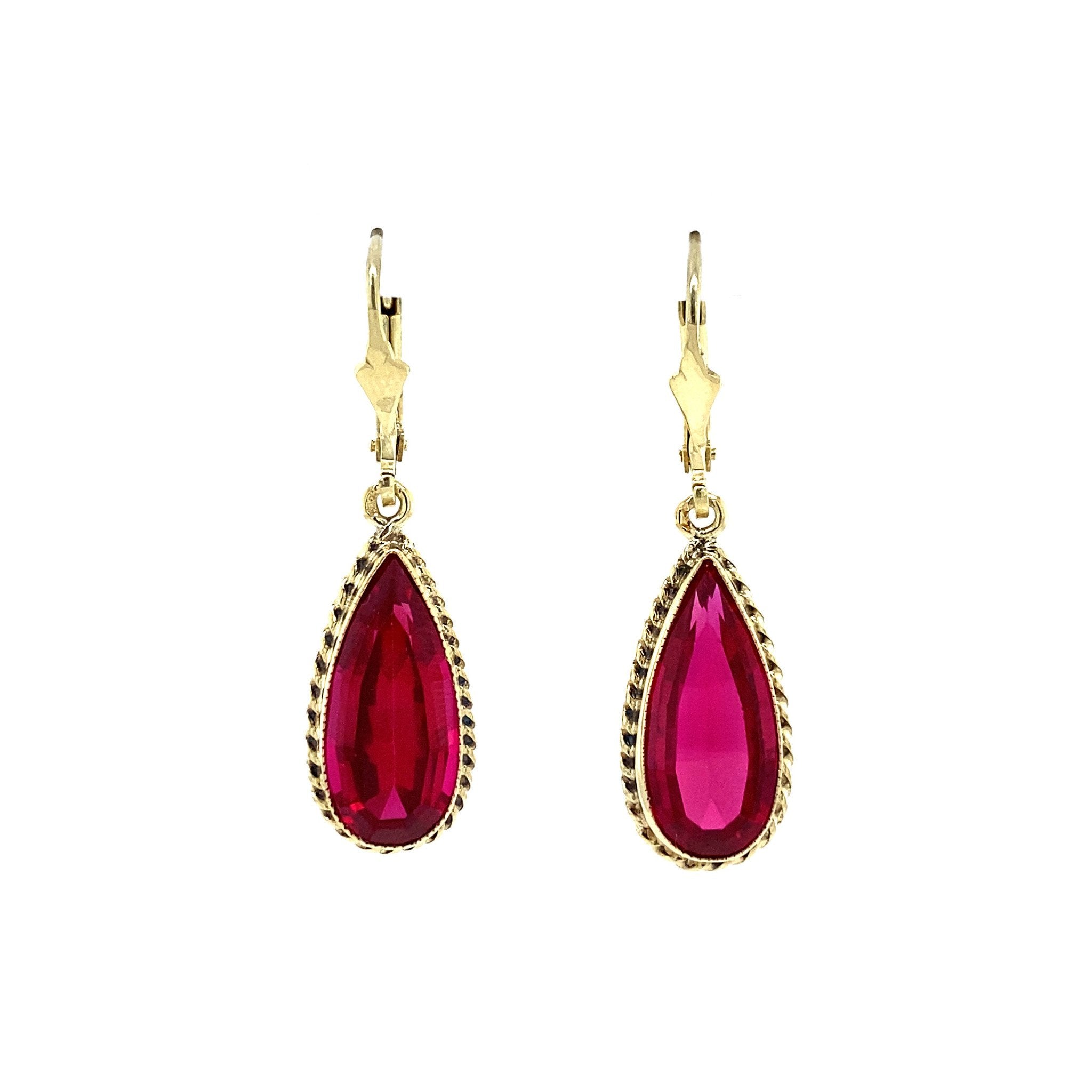 14 kt gold earrings with ruby