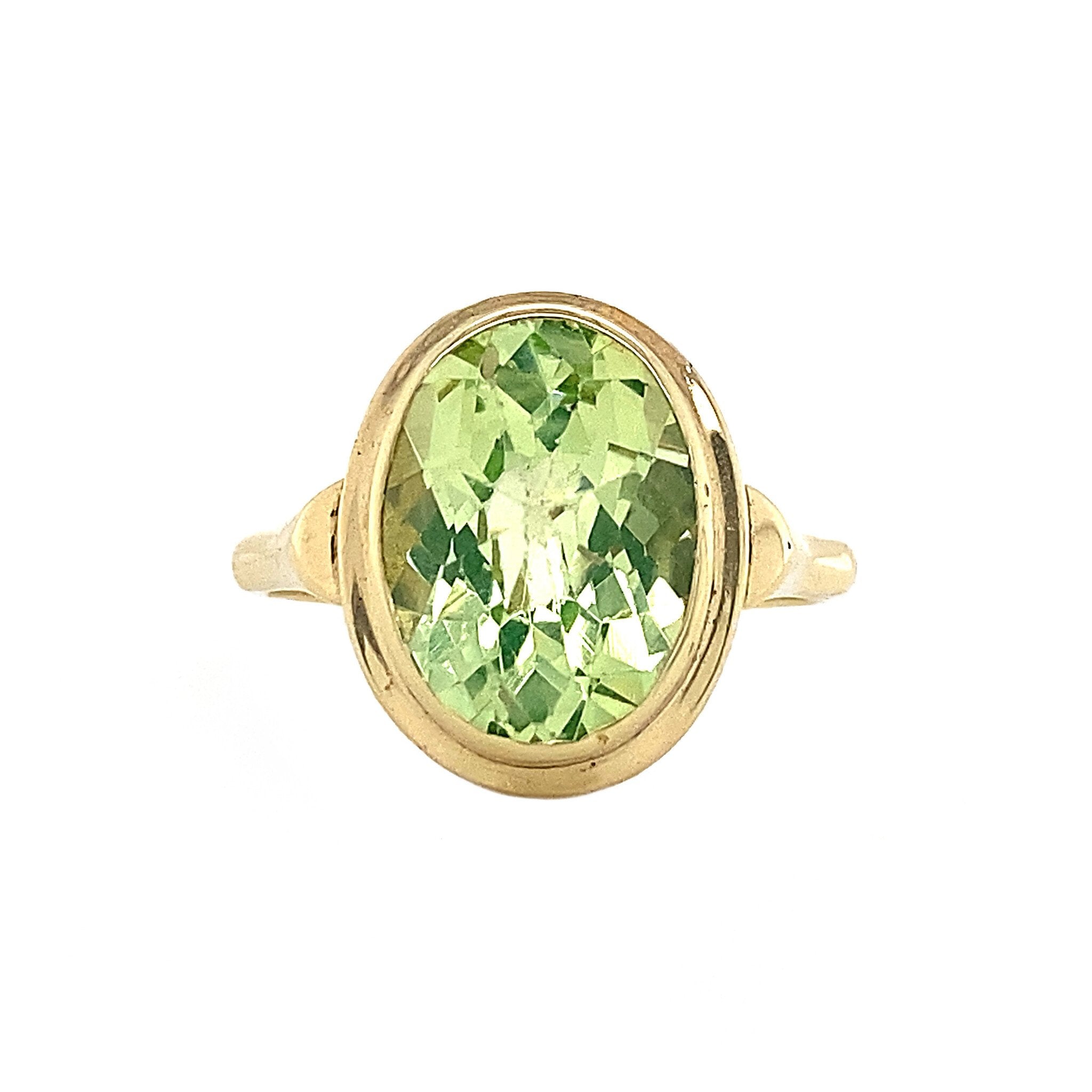 Gouden ring met groene spinel 14 krt