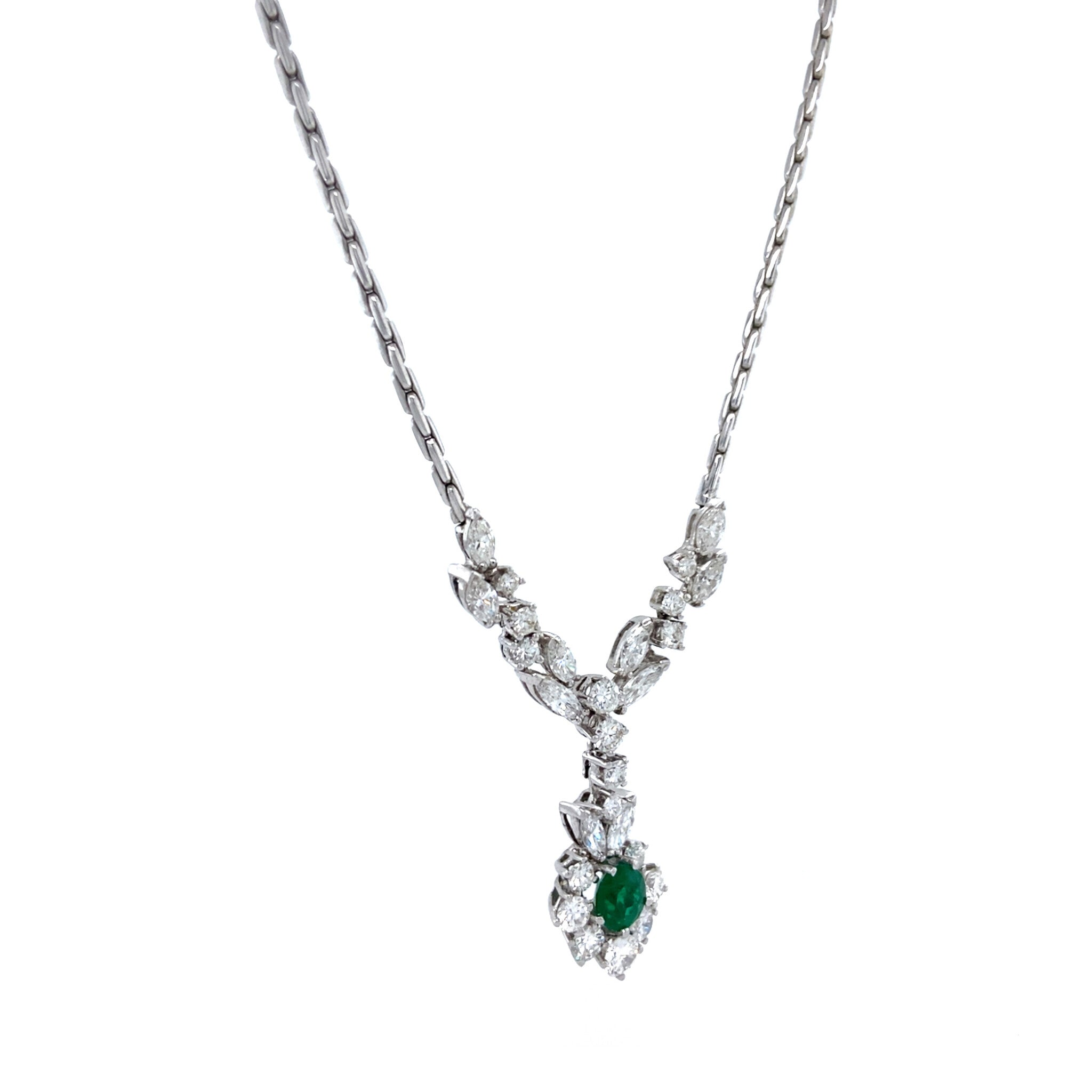 Vintage white-gold necklace with a diamond and emerald halo pendant, 14 kt