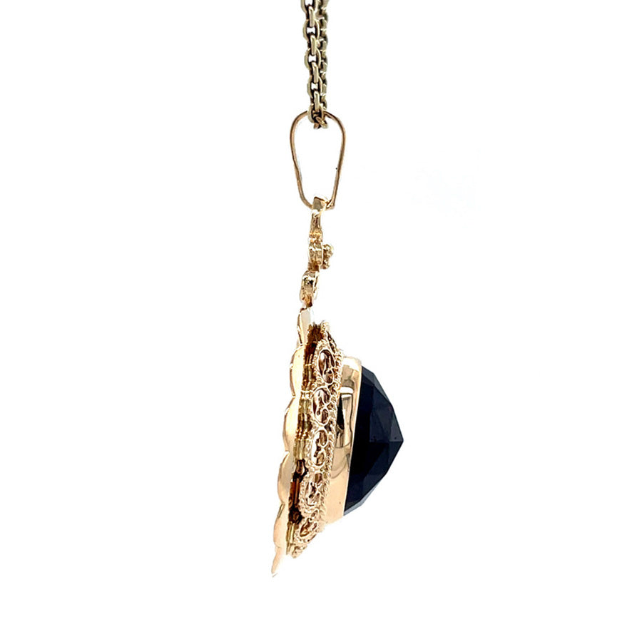 Vintage gold pendant with garnet, 14 kt