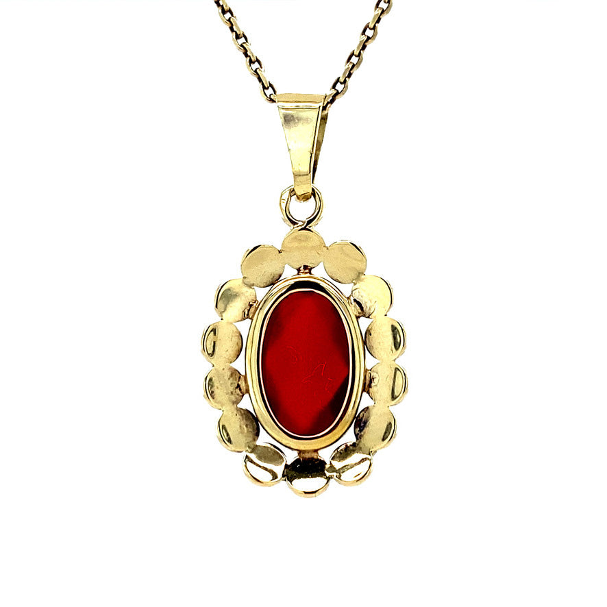 Golden pendant with carnelian 14 kt