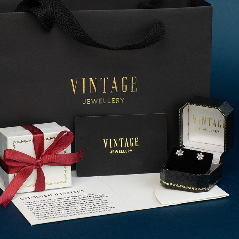 Golden vintage entourage stud earrings with sapphire and zirconia 14 kt