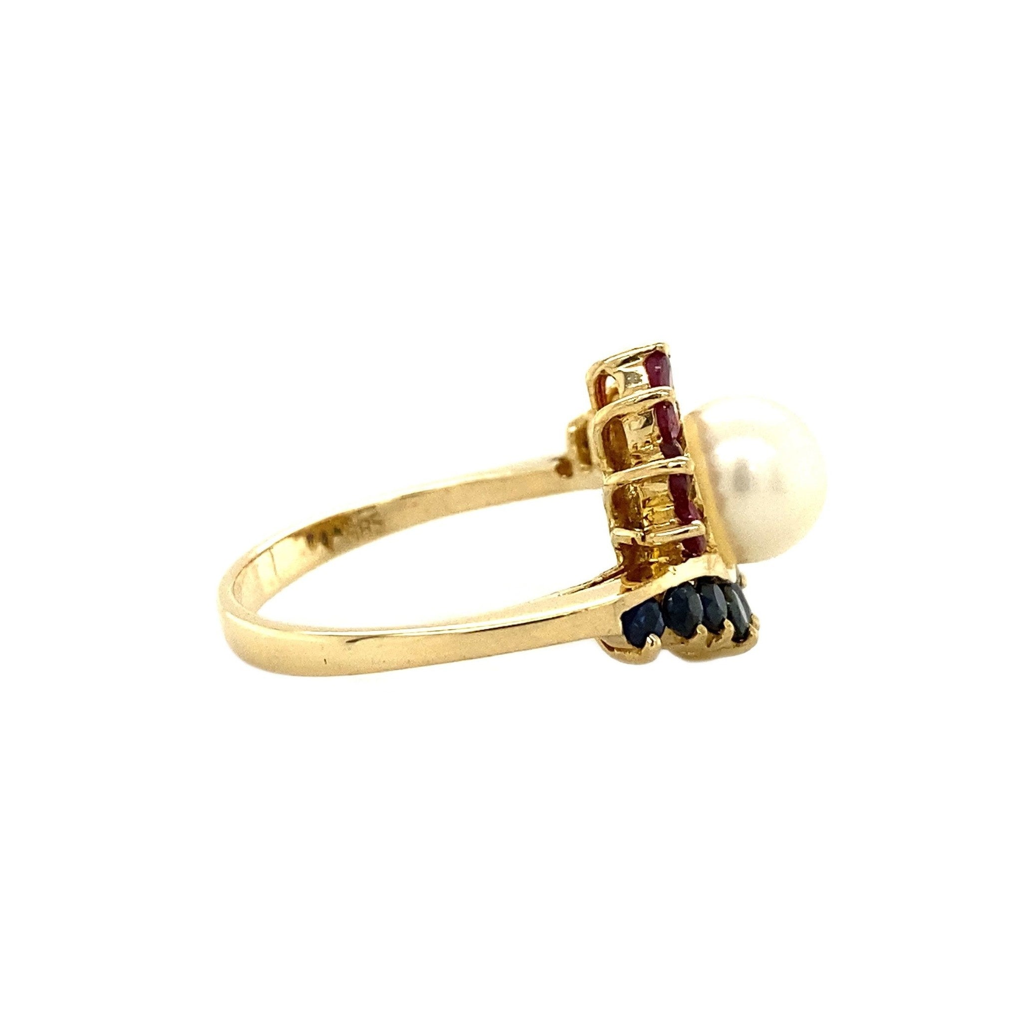 Gouden ring met saffier, robijn en parel 14 krt