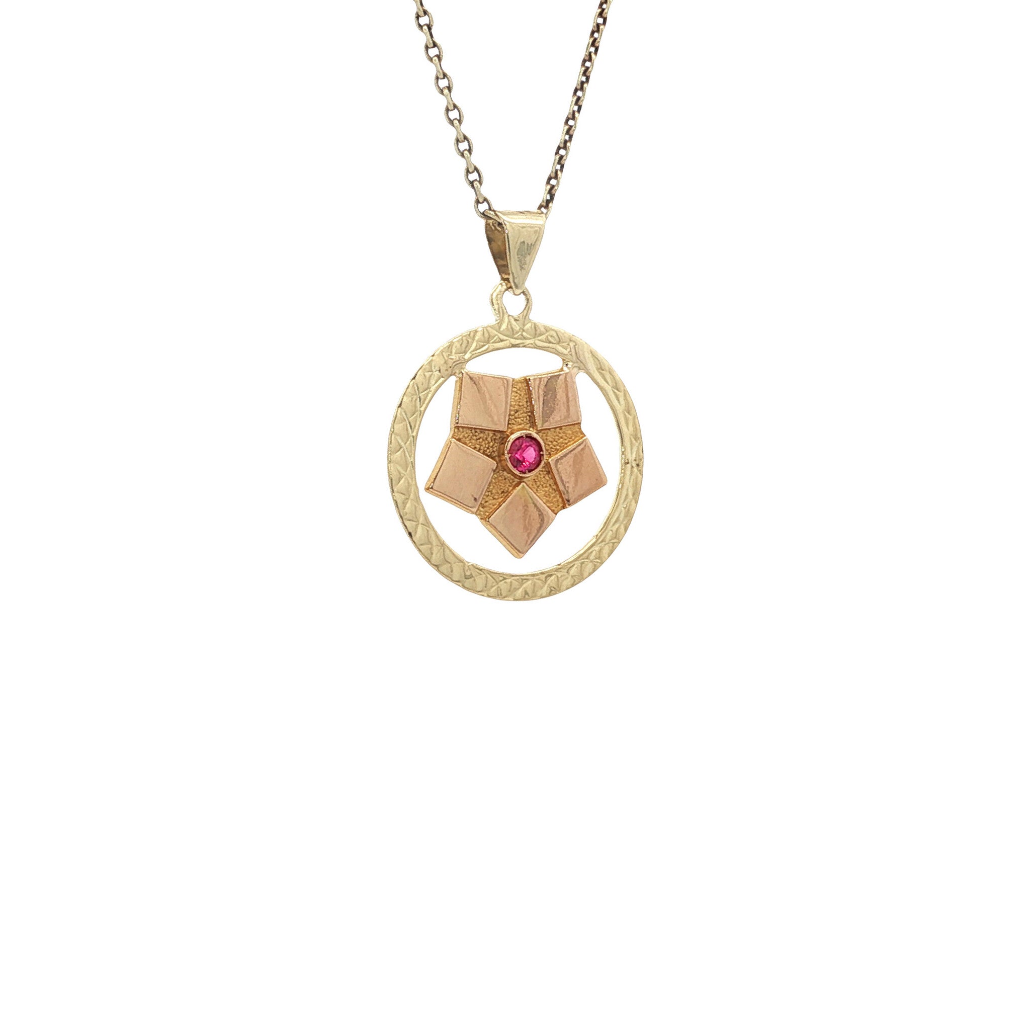Golden vintage star pendant with ruby 14 kt