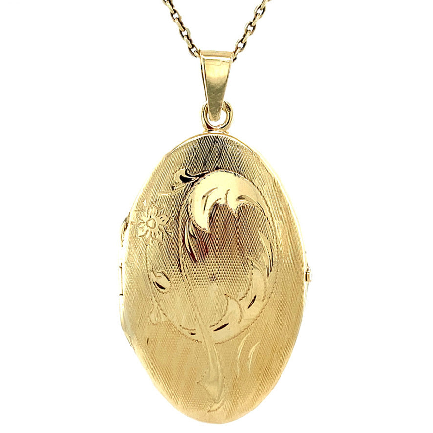 Vintage 14 kt gold locket with engraving
