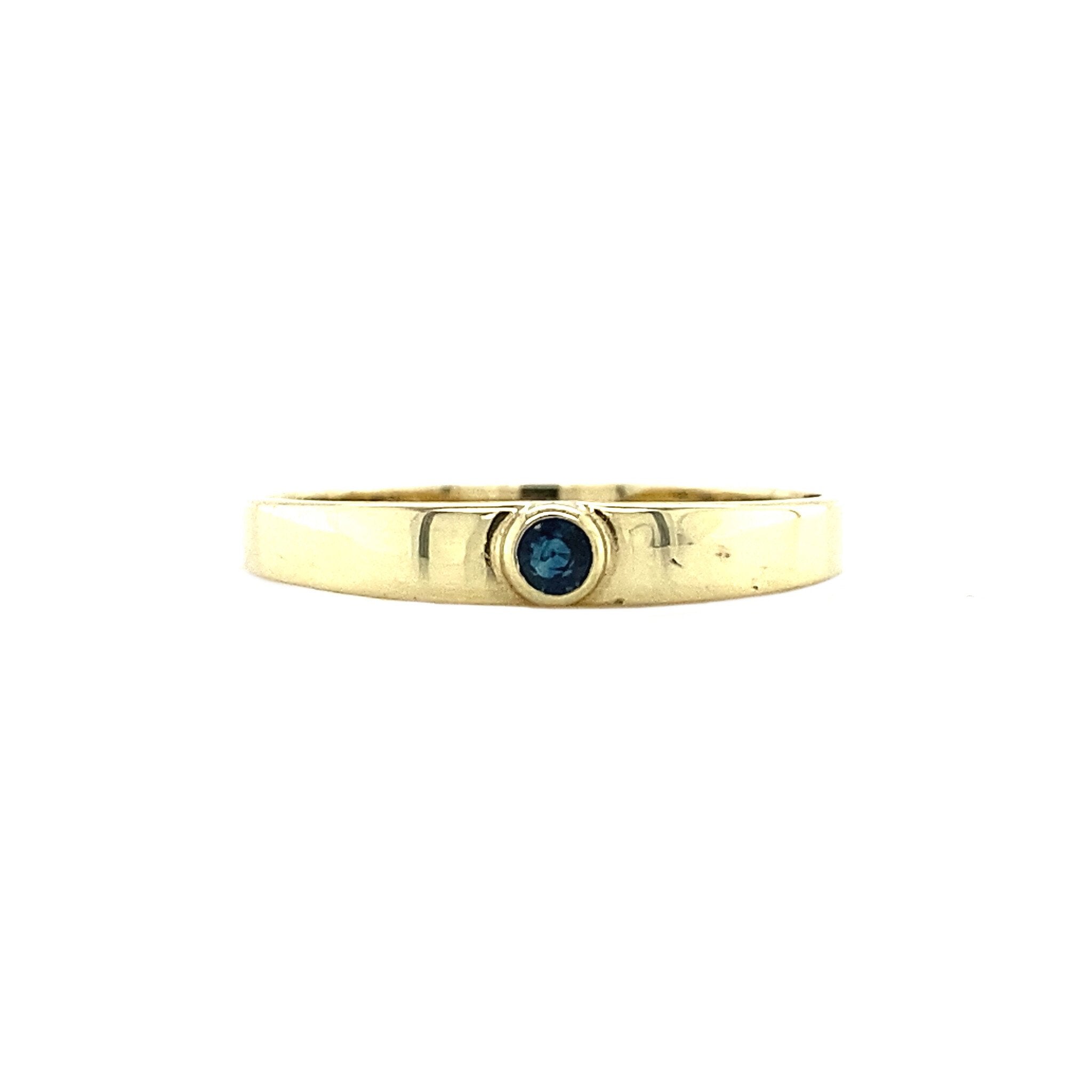 Gouden ring met saffier 14 krt
