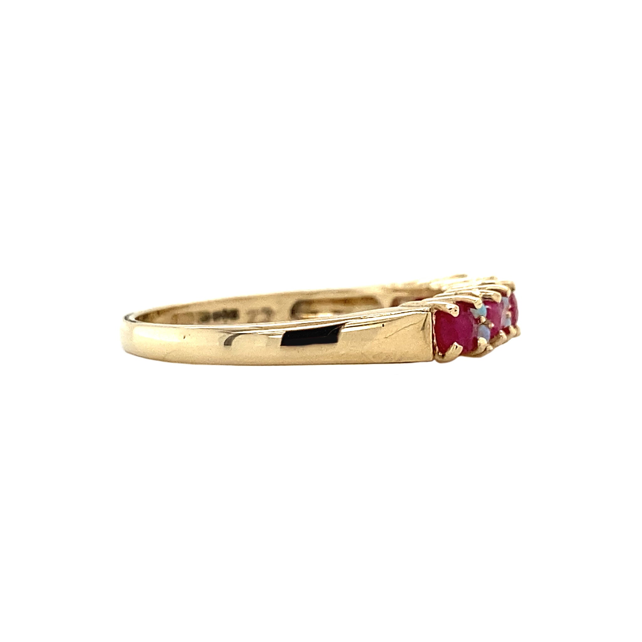 Row ring with opal and ruby 9 krt