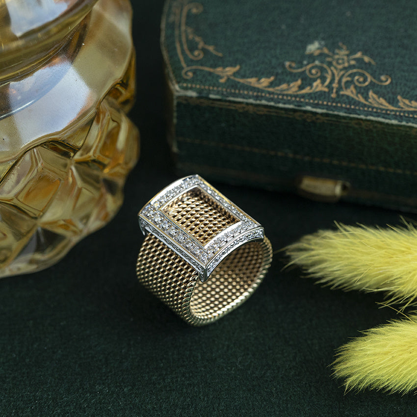 Two-tone vintage 18 kt gold ring with diamond