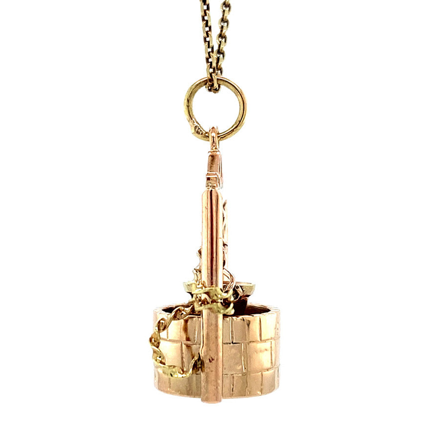 Gold wishing well pendant 14 krt