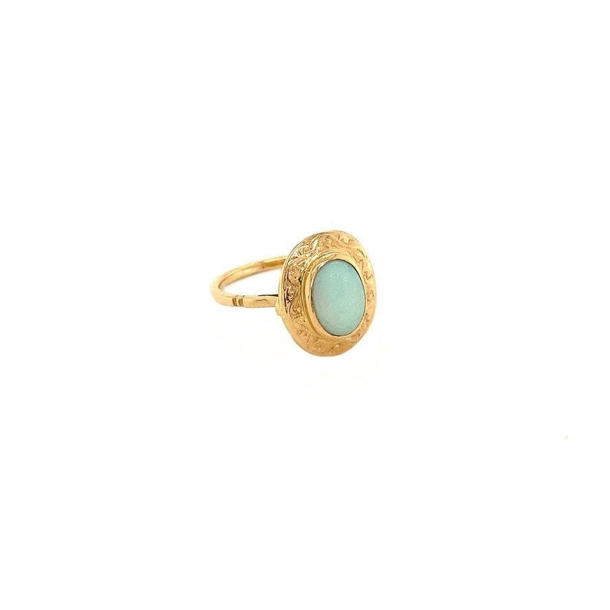 Rosegouden ring met opaal 18 krt