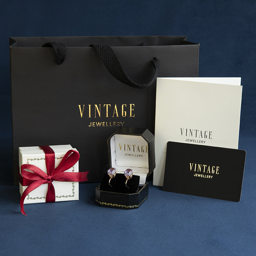 Gouden vintage oorstekers met diamant, robijn, saffier en smaragd 18 krt